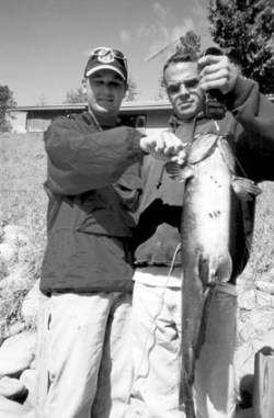 Monster Musky Tries to eat World Record Catfish as Anglers Look On